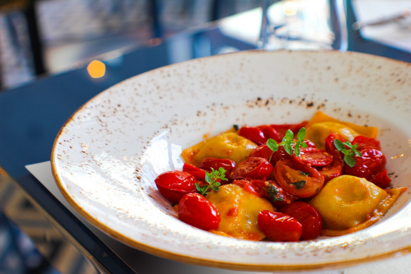 tagAlt.Potato and Pesto filled Ravioli French Beans Cherry Tomatoes and Almonds