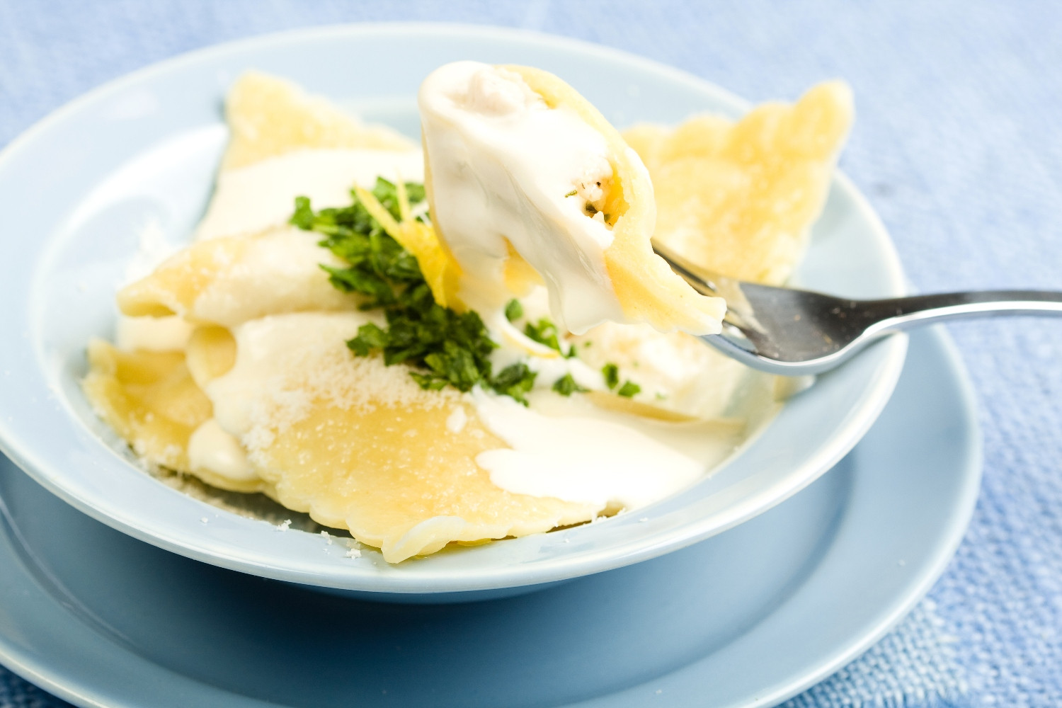 Handmade Ravioli Stuffed with Ricotta and Asparagus, Finished with Velvety Taleggio Sauce